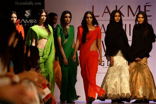 Models showcase designer Anamika Khanna's creations on the second day of the Lakme Fashion Week 2009 in Mumbai, India.