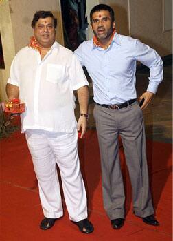 David Dhawan and actor Suniel Shetty arrive for Mata ki chauki at Sanjay Dutt's place on the occasion of Navratri in Mumbai.