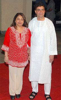 Bollywood Director, Indra Kumar and his wife arrive for Mata ki chauki at the home of actor Sanjay Dutt on the occasion of Navratri.