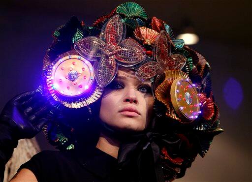 A model displays a creation in the Hedonism display, a display of hats from different designers, during London Fashion Week, in London