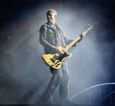 Bass guitarist Adam Clayton of the rock band U2 perform at Giants Stadium, New Jersey.