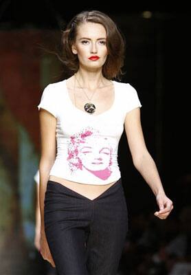 A model wears a creation sporting the image of Marilyn Monroe, part of the Seduzioni Diamonds Valeria Marini Spring/Summer 2010 fashion collection, presented in Milan