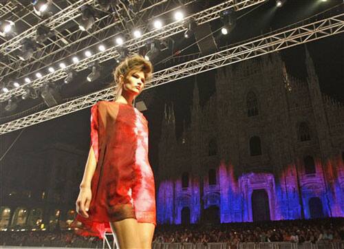 A model wears a creation part of the C'N'C Costume National women's Spring/Summer 2010 fashion collection, presented in Milan's Piazza del Duomo square