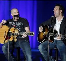 Chris Daughtry and Dane Cook perform during the Andre Agassi Charitable Foundation for Education's Grand Slam for Children benefit concert at Wynn Las Vegas hotel and casino in Las Vegas.