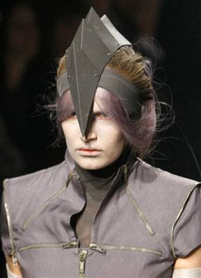 A model wears a creation by British fashion designer Gareth Pugh during the presentation of his Ready to Wear Spring Summer 2010 fashion collection.