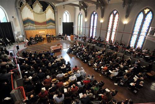 Hundreds gather at Westminster Hall in Baltimore during a reenactment of author Edgar Allan Poe's funeral