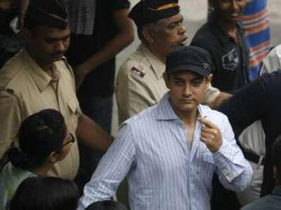 Aamir Khan and wife Kiran Rao leave Bandra polling booth after exercising their franchise.