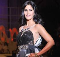 Katrina Kaif walks the ramp for Salman in a dress hand-painted by him.