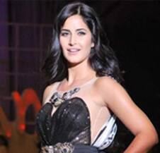 Katrina Kaif walks the ramp for Salman in a dress hand-painted by him.