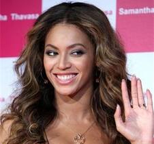 Beyonce waves during a special reception by Japanese bag maker Samantha Thavasa in Tokyo, Japan.