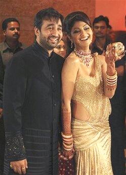 Shilpa Shetty and husband Raj Kundra shake a leg at their wedding reception.