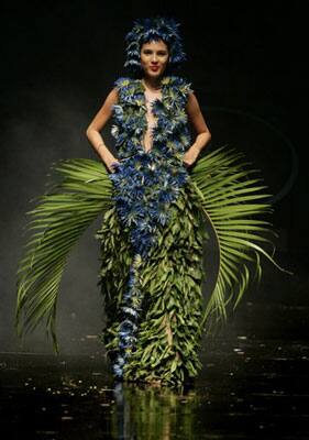 A model showcases a creation made of leaves and flowers by Colombian designer Angela Aponte during the BioFashion show in Colombia.