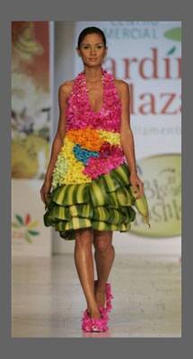 A model showcases a creation made of leaves and flowers by Colombian designer Teresa Chamorro during the Bio Fashion show in Colombia.