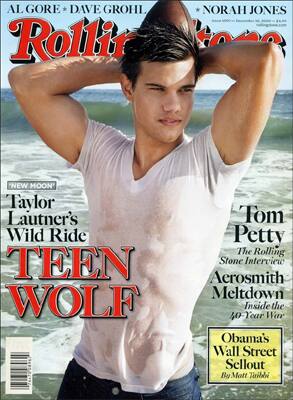 Taylor Lautner flaunts his abs on the cover of Rolling Stone magazine