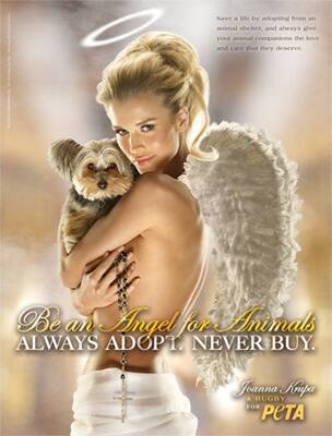 Joanna Krupa goes nude for PETA pet campaign. 