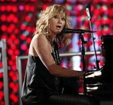 Jennifer Nettles, of the band Sugarland, performs while taping a segment for the Grammy Nominations Concert Live in Los Angeles.