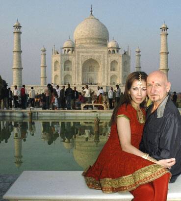 British actor Ben Kingsley (R) and his wife Daniela pose for a picture during their visit at the historic Taj Mahal in the northern Indian city of Agra