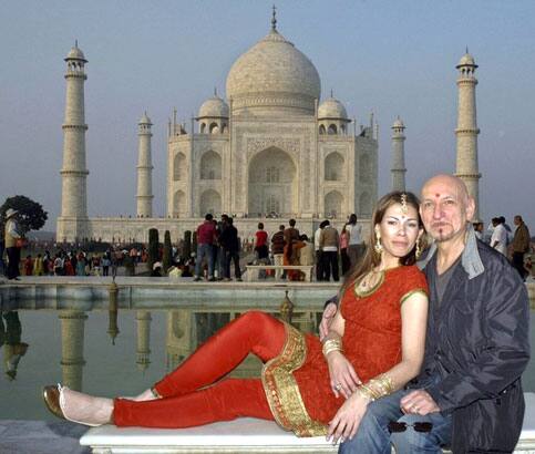 British actor Ben Kingsley (R) and his wife Daniela pose for a picture during their visit at the historic Taj Mahal in the northern Indian city of Agra