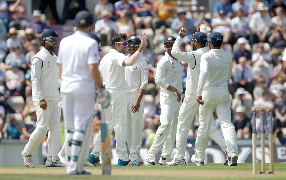 India`s Rohit Sharma, third left, celebrates taking the wicket of England`s Gary Ballance, not pictured, as England`s Ian Bell watches during the second day of the third cricket test match of the series between England and India at The Ageas Bowl in Southampton, England.