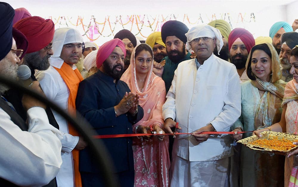 Finance Minister Arun Jaitley and Food Processing Industries Minister Harsimrat Kaur Badal inaugarate a multimedia museum at Bangla Sahib Gurudwara in New Delhi.