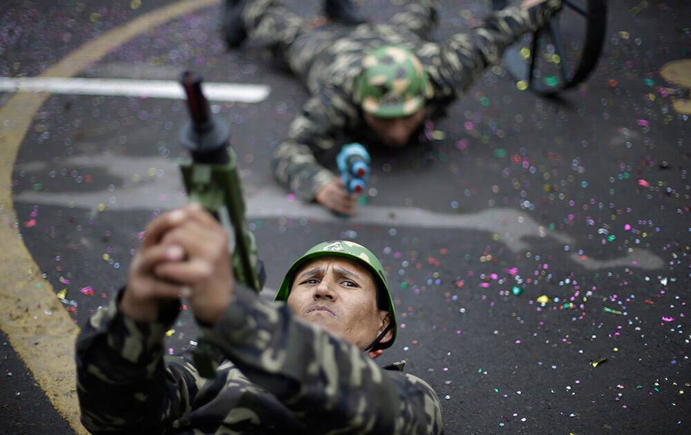 Patients of Larco Herrera Psychiatric Hospital, perform in their own Peruvian Independence Day parade on hospital grounds, in Lima, Peru.