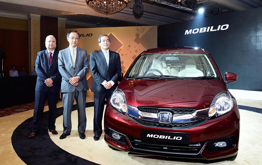 Yoshiyuki Matsumoto, Managing Officer and representative of Development, Purchasing and Production, Asia and Oceania, Honda along with Hironori Kanayama, Honda Car India at the launch of Honda Mobilio in New Delhi.