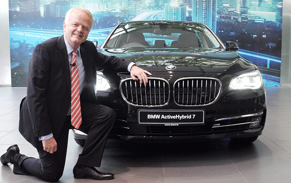 Philipp von Sahr, President, BMW Group India with the newly launched BMW Active Hybrid 7 car in Gurgaon.