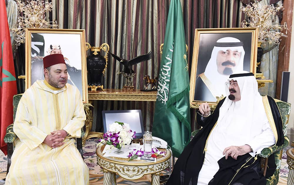 Saudi Arabia`s King Abdullah Bin Abdulaziz, right and Morocco’s king Mohammed VI, left, pose at the Saudi monarch`s palace of Jeddah, Saudi Arabia.