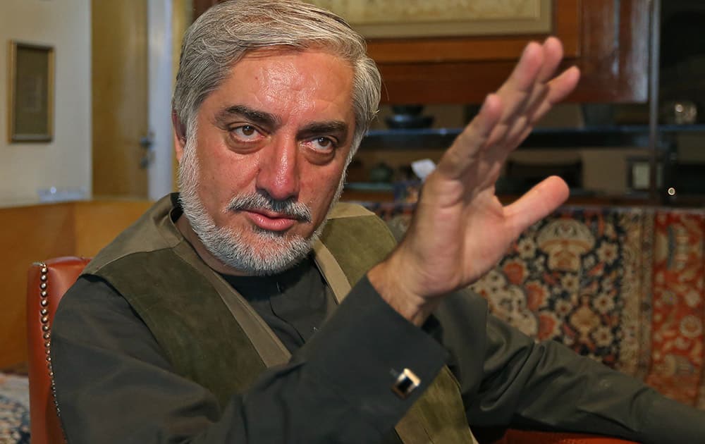 Afghan presidential candidate Abdullah Abdullah speaks during an interview with The Associated Press at his residence in Kabul, Afghanistan.