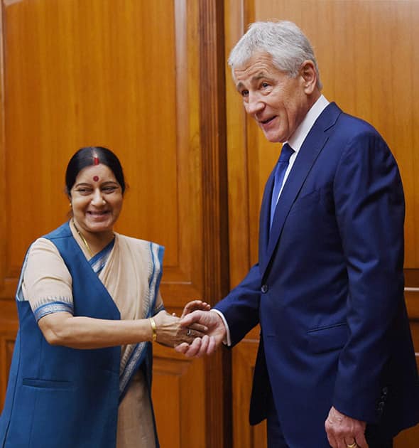 External Affairs Minister Sushma Swaraj shakes hand with US Secretary of Defence Chuck Hagel at a meeting in New Delhi.
