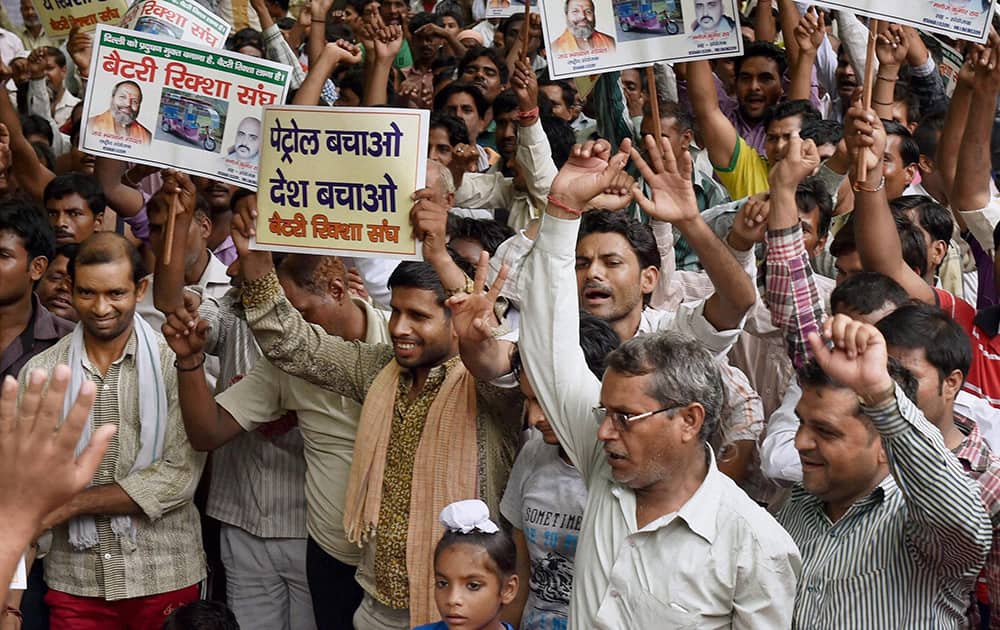 Battery operated rickshaw drivers staging a demonstration against the ban on e-rickshaws at Jantar Mantar in New Delhi.