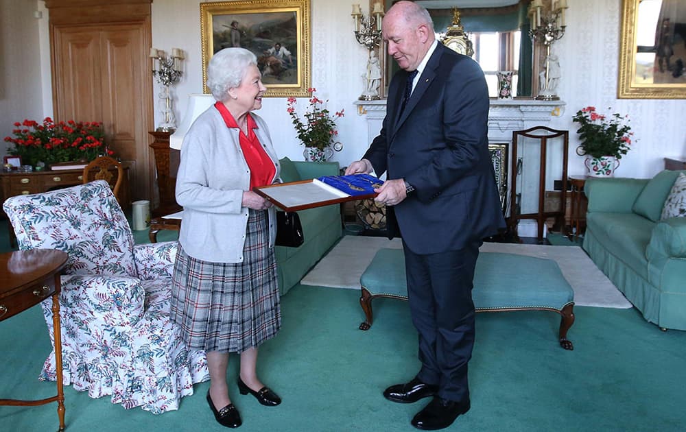 Britain`s Queen Elizabeth II presents the honour of Knight of the Order of Australia to Australian Governor-General Peter Cosgrove, in Balmoral, Scotland.