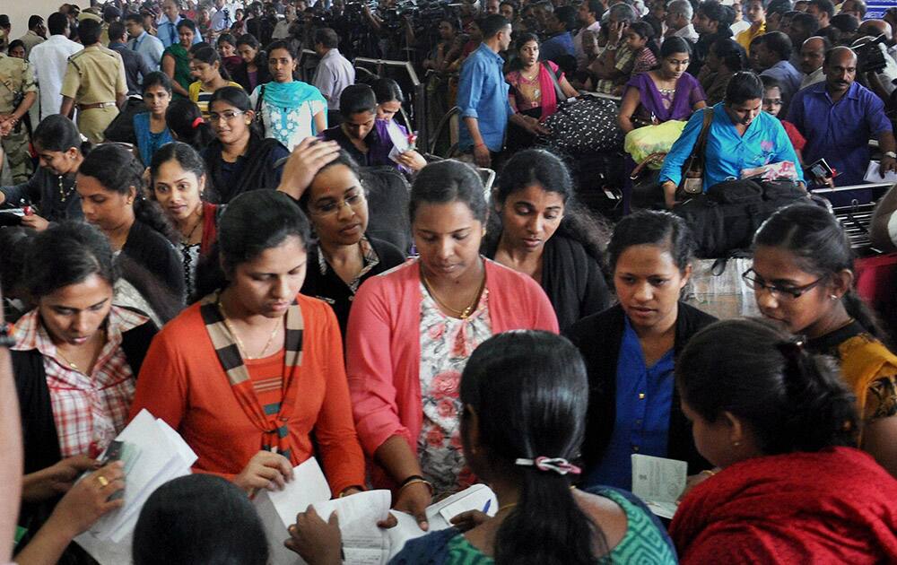 The batch of 44 Kerala nurses, evacuated from Libya, on their arrival at the airport in Kochi.