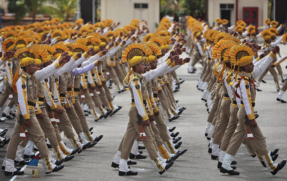 Newly passed officers of India`s Central Industrial Security Force (CISF) march during their passing out parade at National Industrial Security Academy (NISA) on the outskirts of Hyderabad.