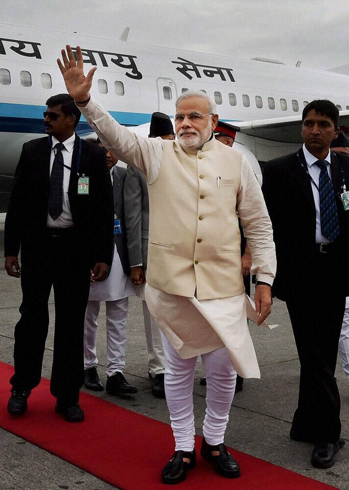 Prime Minister Narendra Modi being welcomed on his arrival at Tribhuvan International Airport in Kathmandu, Nepal.