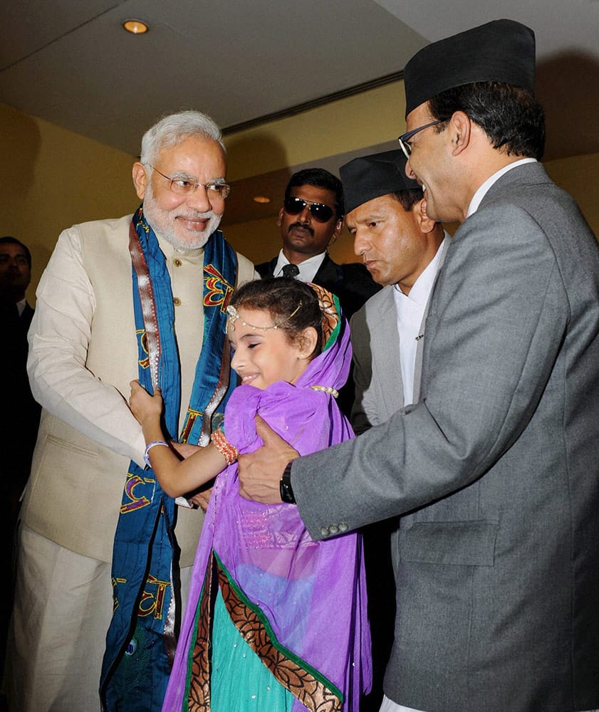 Prime Minister Narendra Modi gets a traditional welcome after reaching the hotel in Kathmandu, Nepal.