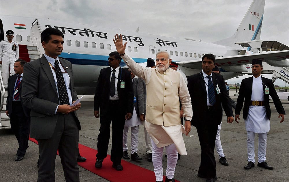 Prime Minister Narendra Modi being welcomed on his arrival at Tribhuvan International Airport in Kathmandu, Nepal.