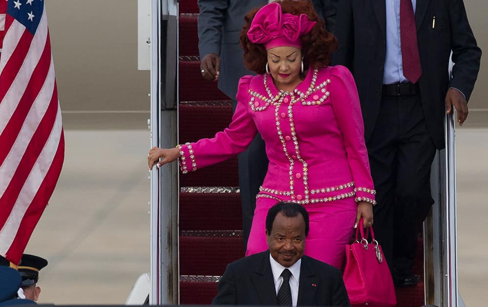 Cameroon President Paul Biya and his wife Chantal arrive at Andrews Air Force Base, Md., for the US-Africa Leaders Summit.