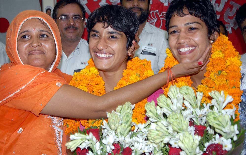 Glasgow 2014 medallists wrestlers Babita Kumari and Vinesh being felicitated Maruti Kamgar Union in Gurgaon.