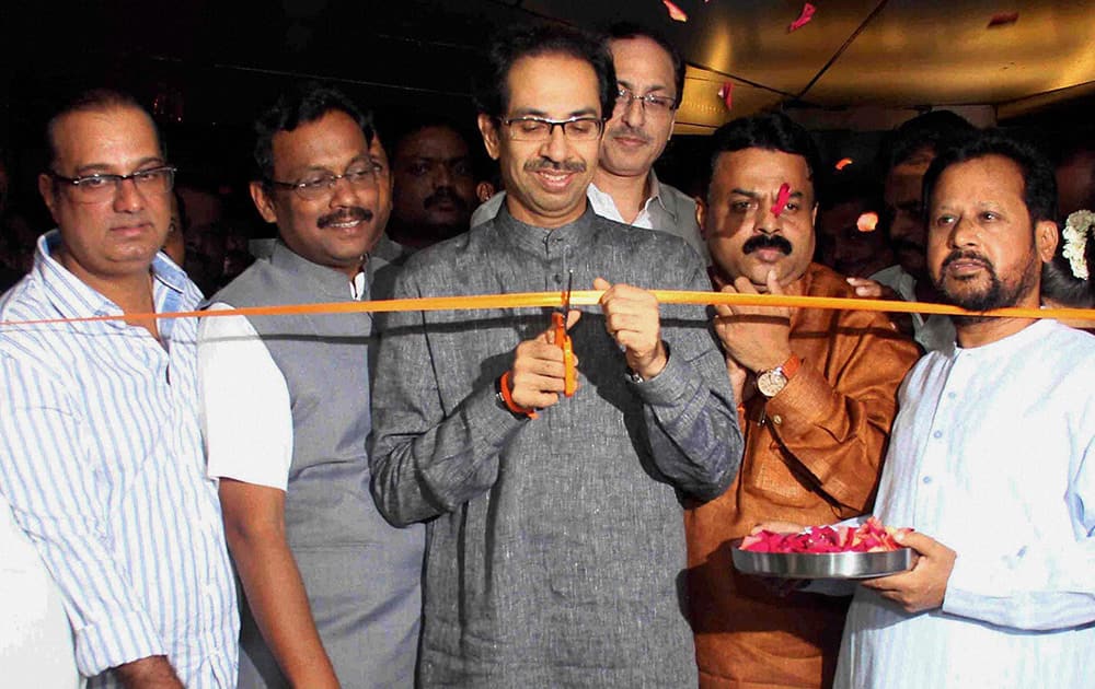 Shiv Sena President Uddhav Thackeray, Mayor Sunil Prabhu, BJP leader Vinod Tawde and MLA Krishna Hegde duirng inauguration of Dinanath Mangeshkar Natyagruha at Vile Parle in Mumbai.