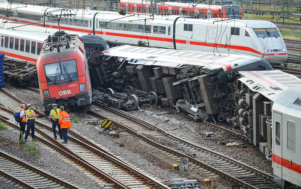 Police investigate near the Mannheim train station after a train accident in Mannheim, Germany.
