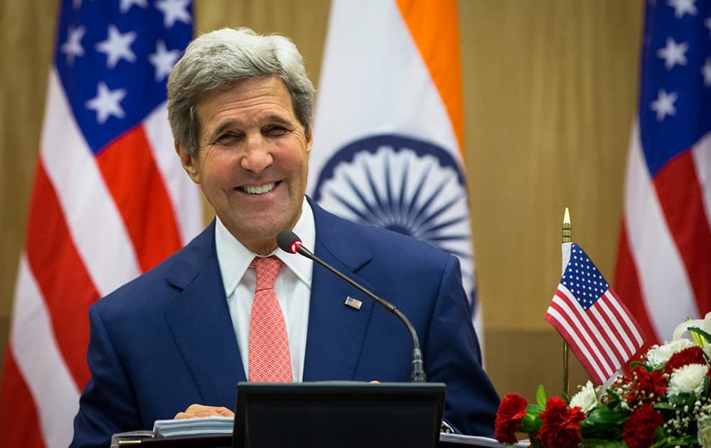 US Secretary of State John Kerry laughs as he answers a question during a press conference addressed jointly with Indian Foreign Minister Sushma Swaraj in New Delhi.