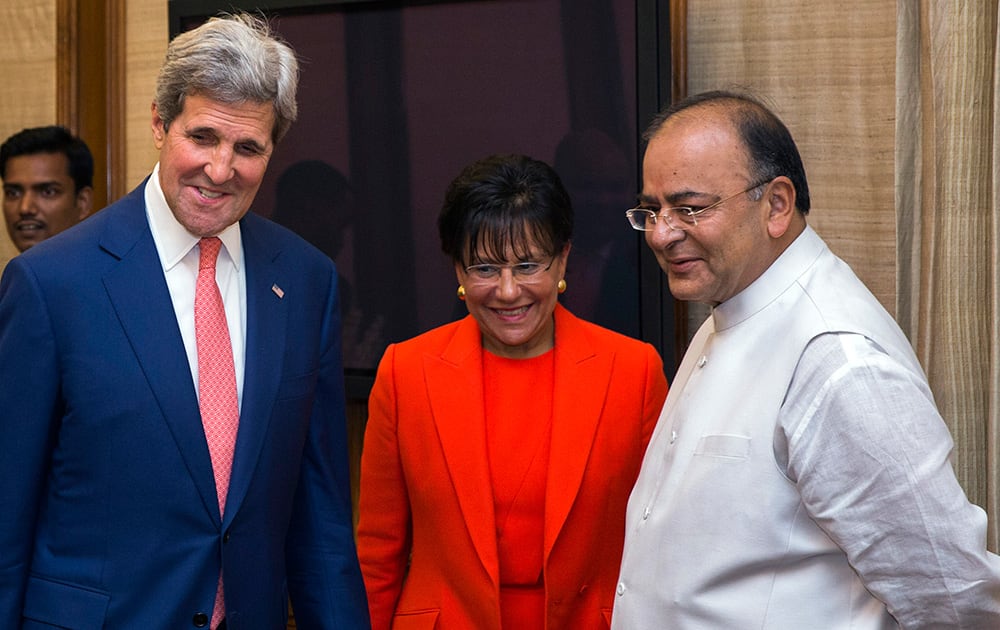 US Secretary of State John Kerry and US Secretary of Commerce Penny Pritzker, stand with Indian Finance and Defense Minister Arun Jaitley in New Delhi.