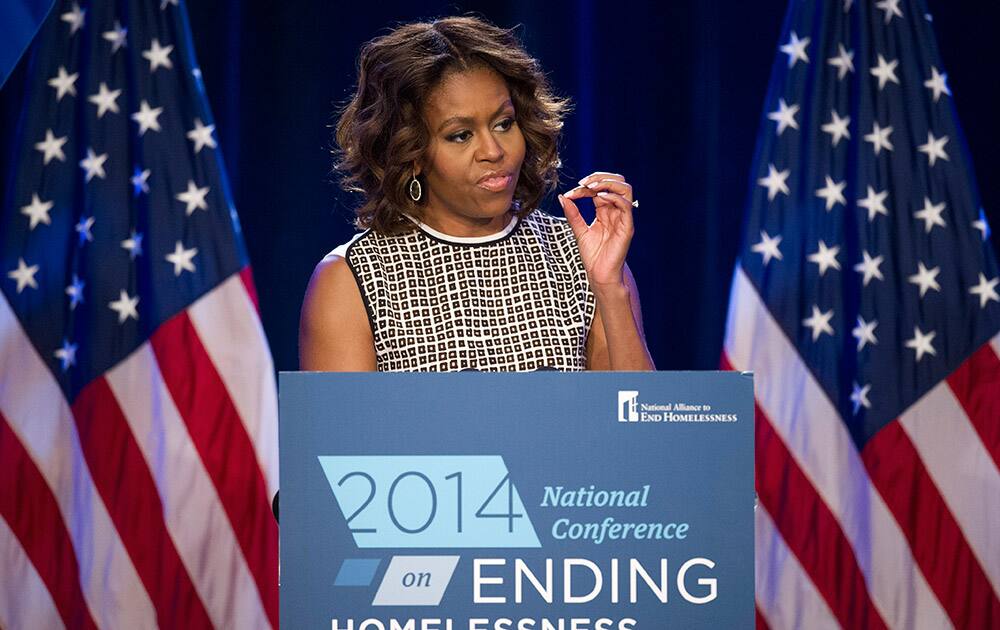 First lady Michelle Obama speaks at the 2014 National Conference on Ending Homelessness, part of the Joining Forces initiative, in Washington.