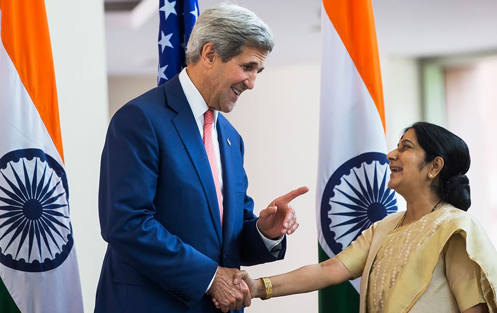 US Secretary of State, John Kerry shakes hands with Indian Foreign Minister Sushma Swaraj in New Delhi.