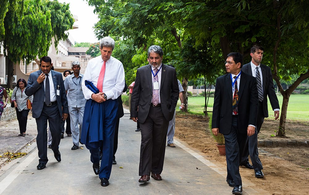 US Secretary of State, John Kerry, walks with Indian Institute of Technology (IIT) Delhi director, R.K. Shevgaonkar, at the IIT campus in New Delhi.