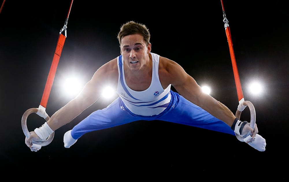 Silver medalist Daniel Keatings of Scotland performs on the rings during the Men`s All-Around gymnastics competition at the Scottish Exhibition Conference Centre during the Commonwealth Games 2014 in Glasgow.