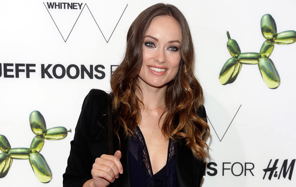 Actress Olivia Wilde attends the opening of the H&M Fifth Avenue flagship store in New York. 