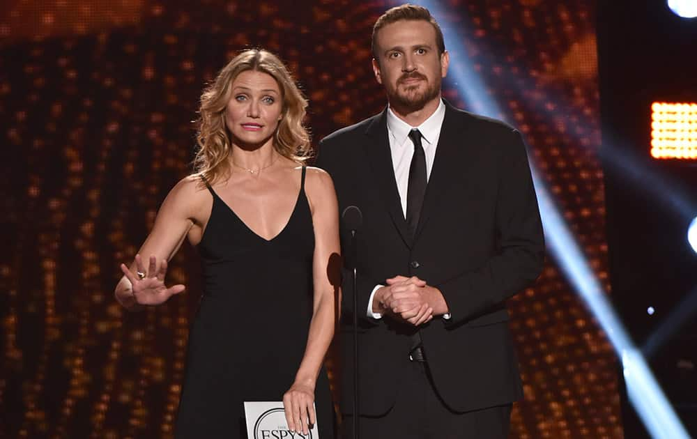 Cameron Diaz, left, and Jason Segel, right, present the award for best breakthrough athlete at the ESPY Awards at the Nokia Theatre in Los Angeles. 