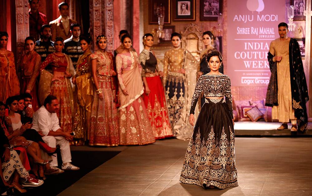 Actor Kangana Ranaut, displays a dress created by Indian designer Anju Modi at the India Couture Week, held by Fashion Design Council of India, in New Delhi.